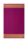 The Classic Silk Saree in Parakeet green and Byzantine Purple Border